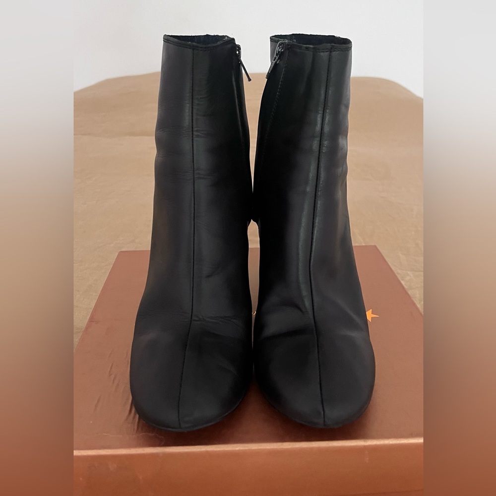 leather boots with wooden heels